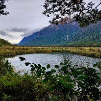 20250501_110609 Traveling along the Eglinton River in a valley between the mountain ranges near Mount Eglinton.
