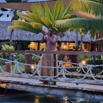 20250506_175737 Every evening a local blows a huge conch shell and another goes around the entire property lighting the torches for the evening.