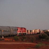 IMG_2214 The sunrise bouncing off the Ghan Train at Marla in Marla the middle of the outback.