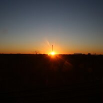 IMG_2220 Sunrise is upon us. We took a moment to enjoy the stillness on this short 45 minute stop with the promise of the day stretching before us.