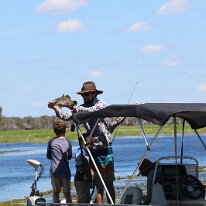 IMG_2312 His catch is a Barramundi, a popular fish species known by various names including Asian sea bass and giant sea perch. This type of fish was available in many...