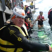 DSCN1649 We were provided with a rash guard and snorkeling equipment. Sharon brought her own full face mask to do her snorkeling.