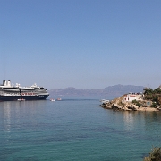 IMG_1808 Our Holland America cruise ship the Zuiderdam moored off the coast of Mykonos. The famous Chora, Mykonos windmills are on the right.