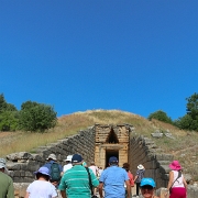 IMG_0984-2 This is Sharon in front of a Tholos or beehive tomb on the Panagitsa Hill at Mycenae, Greece. It is thought to be either the Treasury of Atreus or Tomb of...