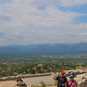 IMG_1018-2 Kris and Sharon with the plain behind them. At the time of Agamemnon that plain was flooded by the Mediterranean Sea.