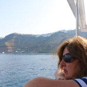 IMG_1702 Sharon looking out at the crystal blue waters of the Aegean Sea. Jacques Cousteau looked for the lost city of Atlantis here.