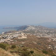 IMG_1708 The island of Thira, Santorini as seen from the top of it's acropolis. Below is the town of Pirgos with Fira behind. At the tip of the island can be seen the...