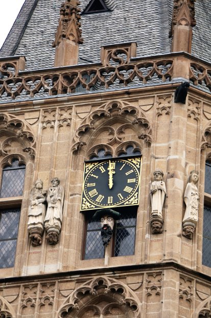 U_Cologne00059 The wooden figure of a man, seen on the Old City Hall, sticks out its tongue when the tower bell strikes the hour.